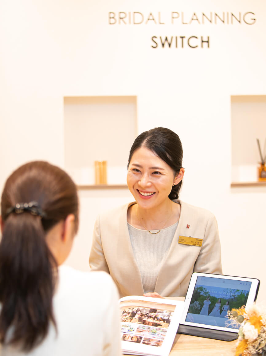お客様へ提案をするSさん